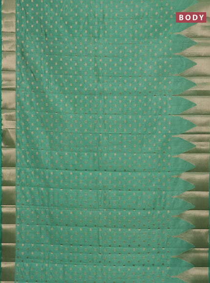 Semi raw silk saree pastel green with allover zari woven 1000 buttas and temple design zari woven border