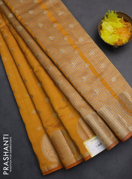 Semi raw silk saree mustard yellow with allover zari woven 1000 buttas and paisley zari woven butta border