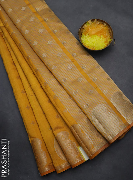 Semi raw silk saree mustard yellow with allover zari woven 1000 buttas and paisley zari woven butta border