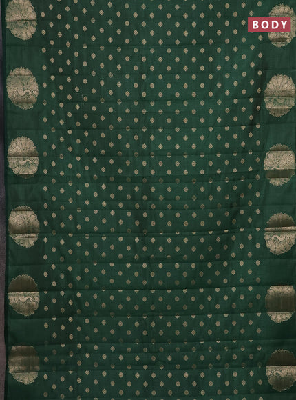 Semi raw silk saree dark green with allover zari woven floral design 1000 buttas and zari woven butta border