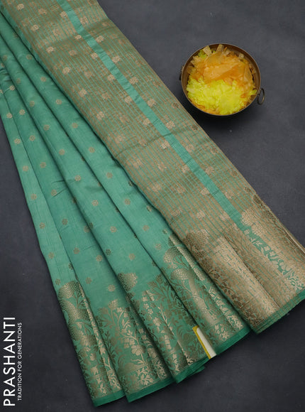 Semi raw silk saree pastel green with allover zari woven floral design 1000 buttas and rich zari woven border