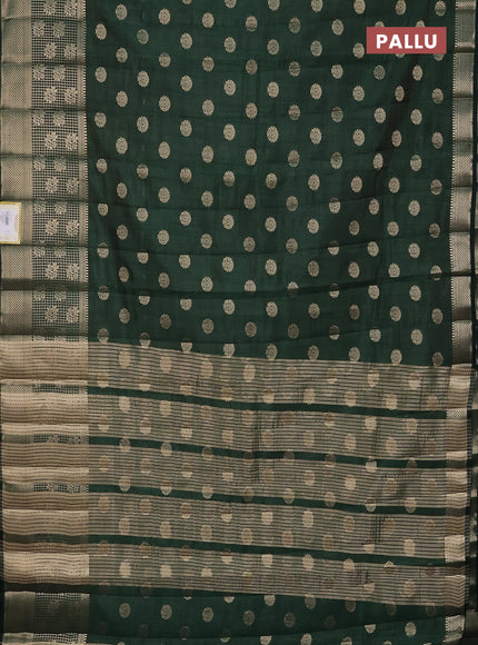 Semi raw silk saree bottle green with allover zari woven 1000 buttas and long zari woven border