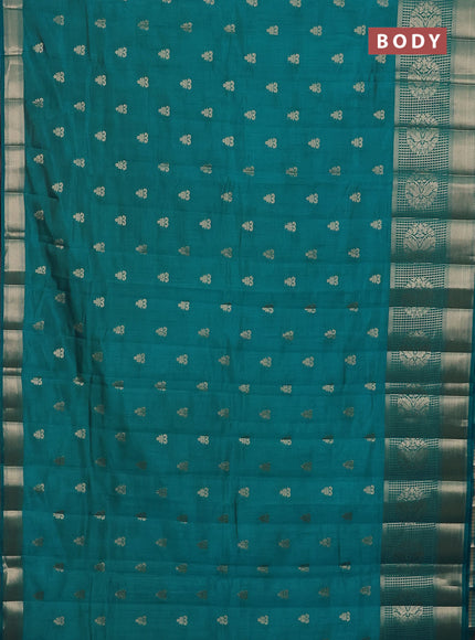 Semi raw silk saree teal blue shade with allover zari woven 1000 buttas and long zari woven border