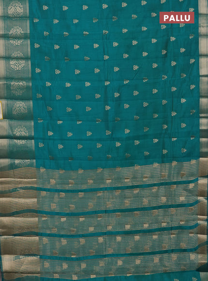 Semi raw silk saree teal blue shade with allover zari woven 1000 buttas and long zari woven border