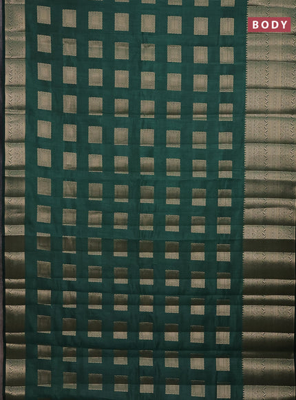 Semi raw silk saree dark green with zari woven box type buttas and long zari woven border