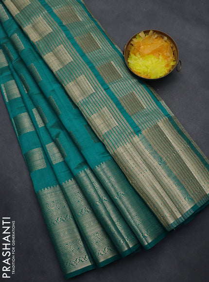 Semi raw silk saree teal blue with zari woven box type buttas and long zari woven border