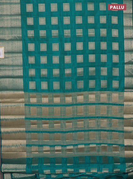 Semi raw silk saree teal blue with zari woven box type buttas and long zari woven border