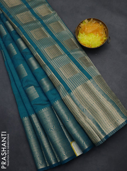 Semi raw silk saree cs blue with zari woven box type buttas and long zari woven border
