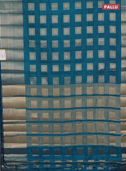 Semi raw silk saree cs blue with zari woven box type buttas and long zari woven border
