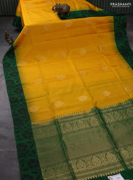 Ikat soft silk saree mango yellow and green with allover zari woven buttas and ikat style border