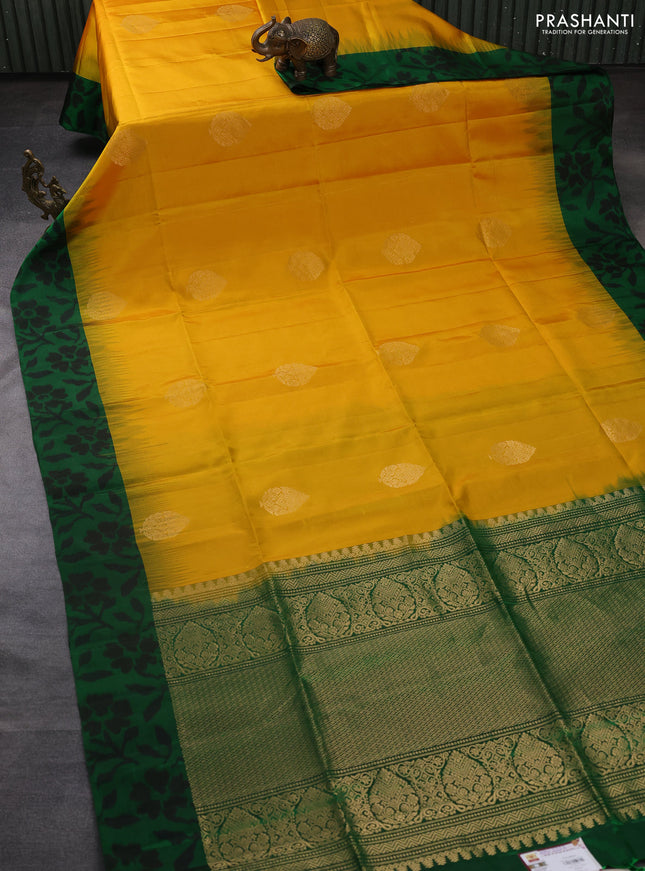 Ikat soft silk saree mango yellow and green with allover zari woven buttas and ikat style border