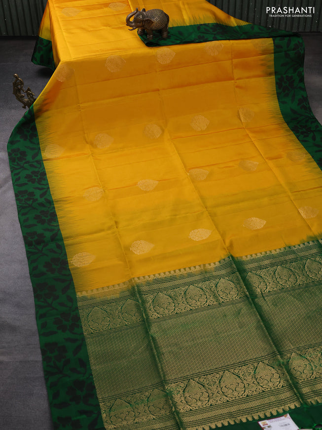 Ikat soft silk saree mango yellow and green with allover zari woven buttas and ikat style border