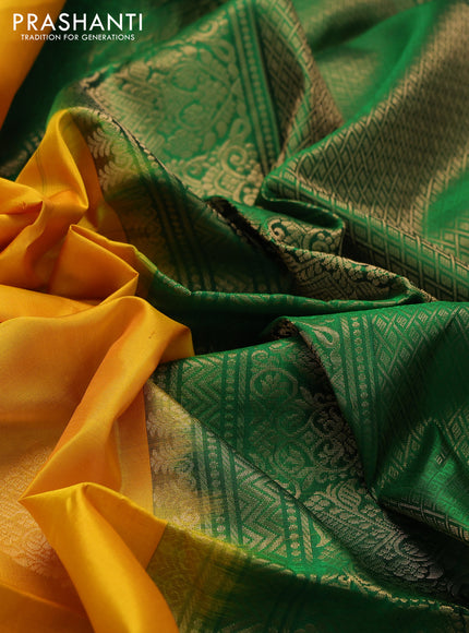Ikat soft silk saree mango yellow and green with allover zari woven buttas and ikat style border