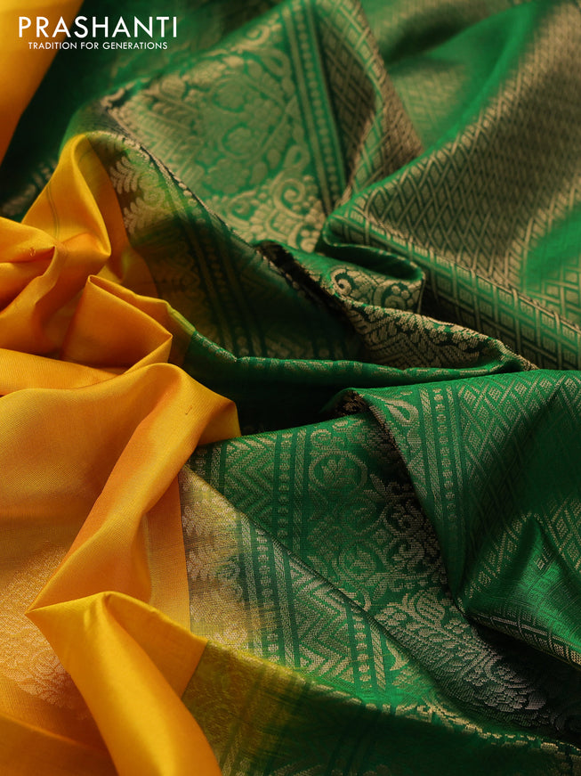 Ikat soft silk saree mango yellow and green with allover zari woven buttas and ikat style border