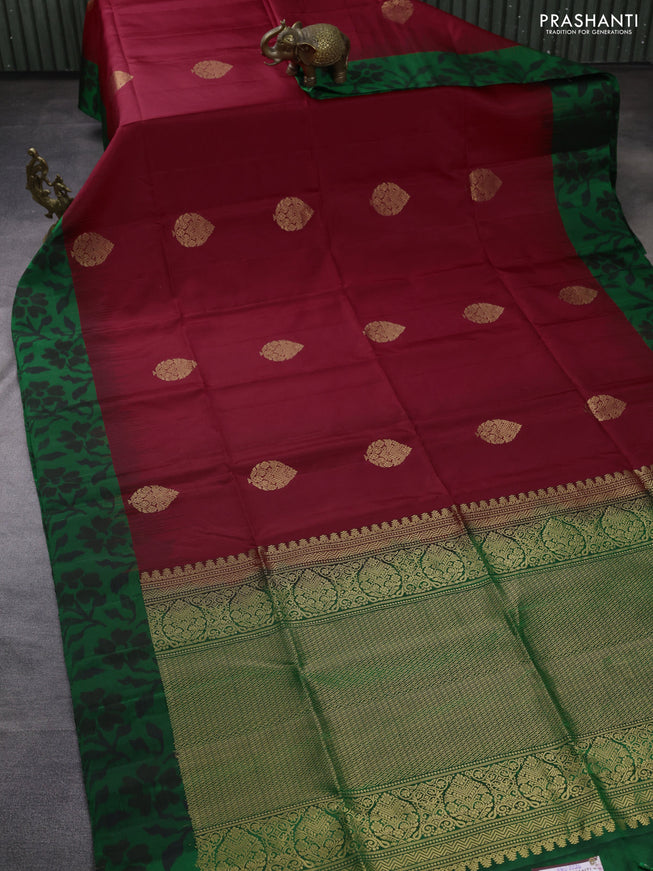 Ikat soft silk saree red and green with allover zari woven buttas and ikat style border