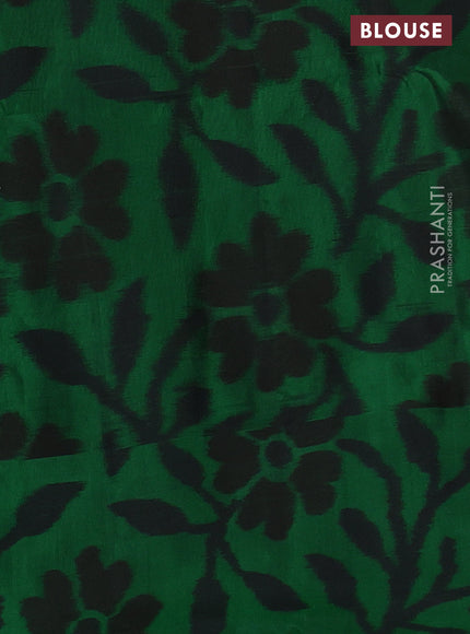 Ikat soft silk saree red and green with allover zari woven buttas and ikat style border