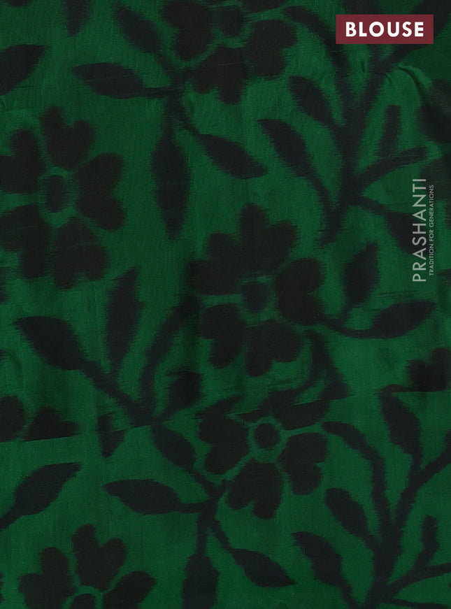 Ikat soft silk saree red and green with allover zari woven buttas and ikat style border