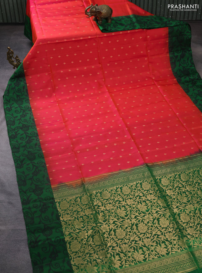 Ikat soft silk saree dual shade of pinkish orange and green with allover zari woven buttas and ikat style border
