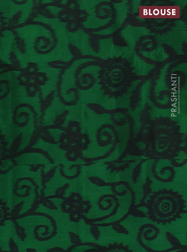 Ikat soft silk saree dual shade of pinkish orange and green with allover zari woven buttas and ikat style border