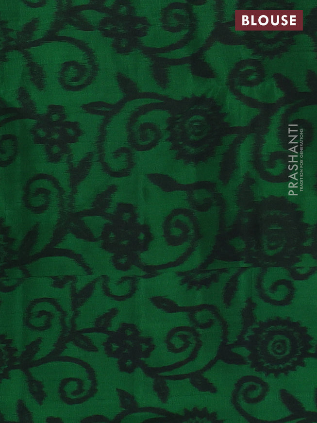 Ikat soft silk saree dual shade of pinkish orange and green with allover zari woven buttas and ikat style border