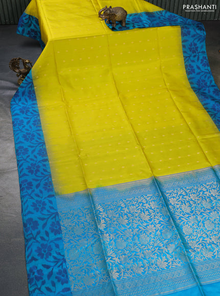 Ikat soft silk saree lime yellow and dual shade of teal blue with allover zari woven buttas and ikat style border