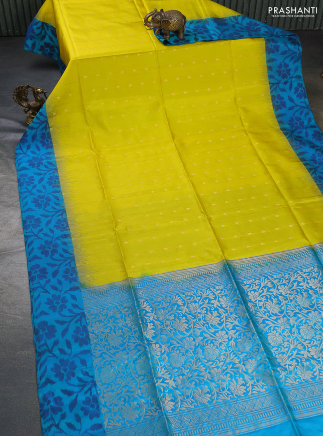 Ikat soft silk saree lime yellow and dual shade of teal blue with allover zari woven buttas and ikat style border