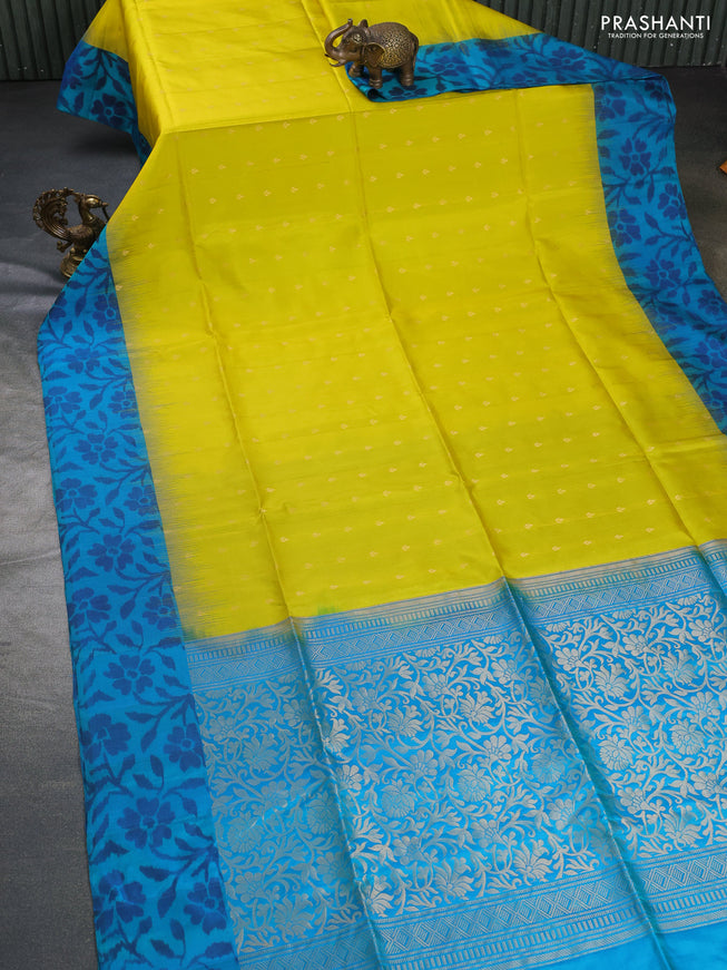 Ikat soft silk saree lime yellow and dual shade of teal blue with allover zari woven buttas and ikat style border