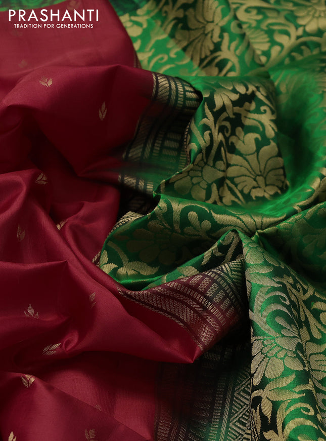 Ikat soft silk saree red and green with allover zari woven buttas and ikat style border