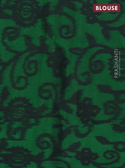 Ikat soft silk saree red and green with allover zari woven buttas and ikat style border