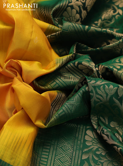 Ikat soft silk saree mango yellow and green with allover zari woven buttas and ikat style border