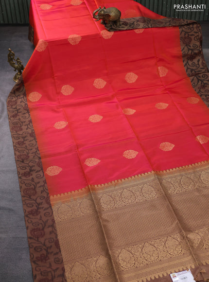 Ikat soft silk saree dual shade of pinkish orange and dark sandal with zari woven buttas and ikat style border