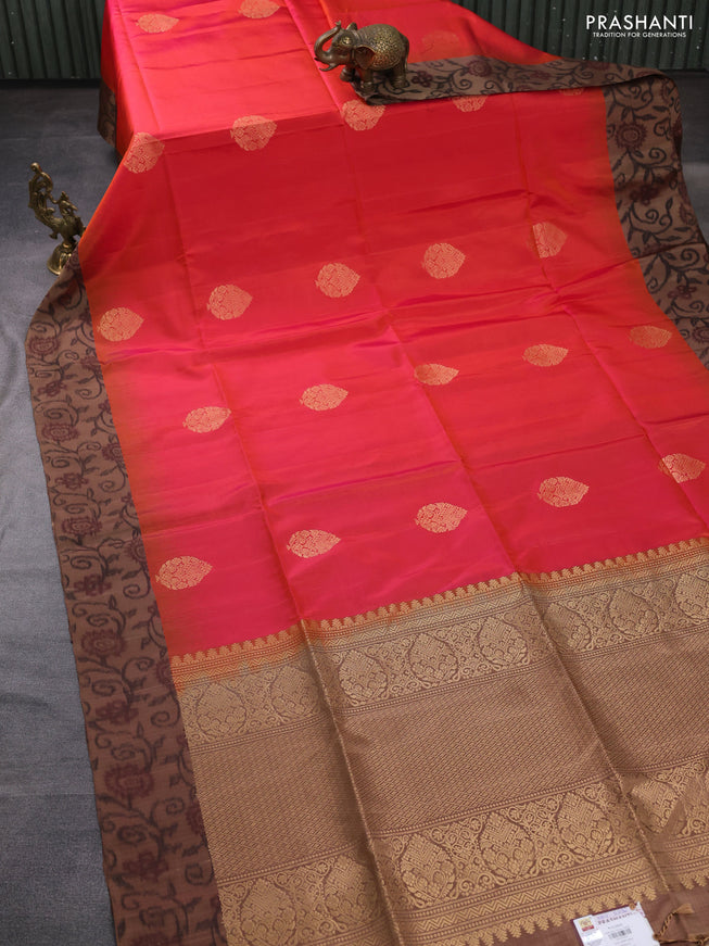 Ikat soft silk saree dual shade of pinkish orange and dark sandal with zari woven buttas and ikat style border