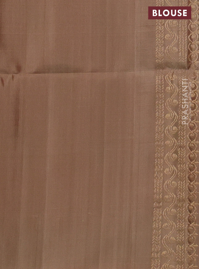 Ikat soft silk saree pink shade and dark sandal with allover ikat weaves & floral zari buttas in borderless style