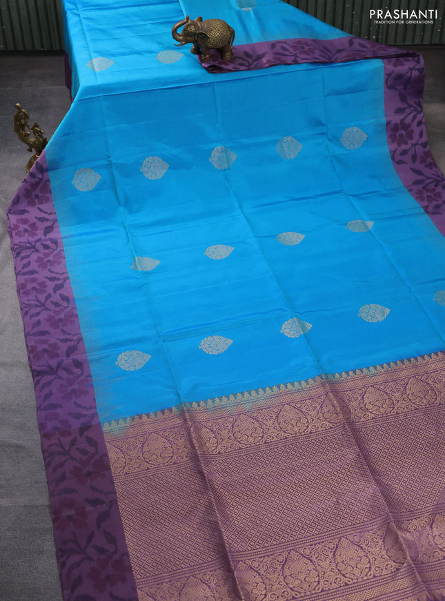 Ikat soft silk saree dual shade of teal blue and pastel purple with zari woven buttas and ikat style border