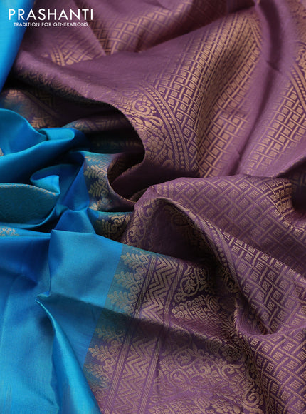 Ikat soft silk saree dual shade of teal blue and pastel purple with zari woven buttas and ikat style border