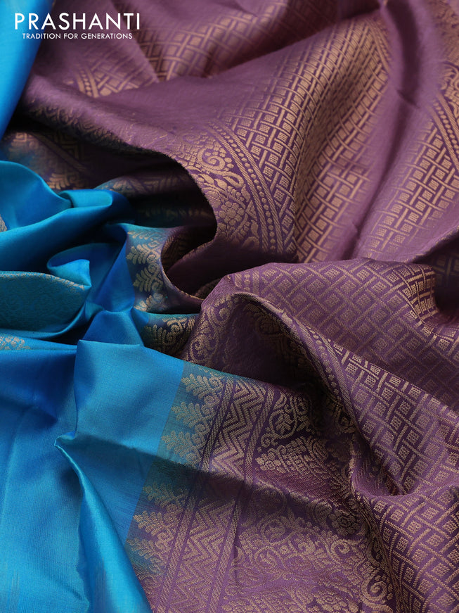Ikat soft silk saree dual shade of teal blue and pastel purple with zari woven buttas and ikat style border
