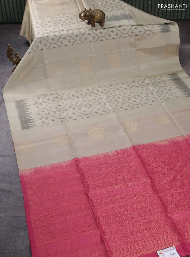 Ikat soft silk saree beige and pink shade with allover ikat weaves & floral zari buttas in borderless style
