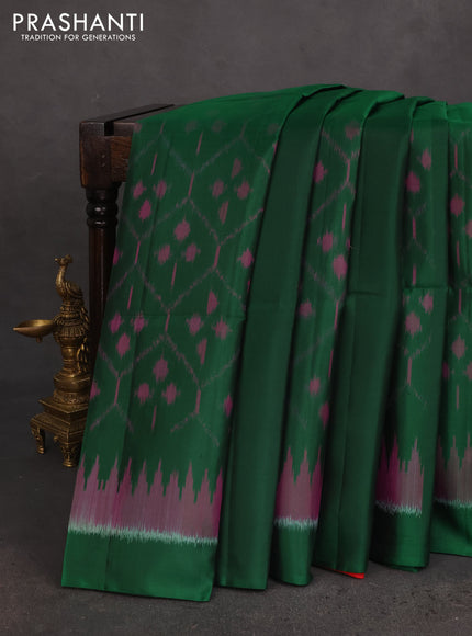 Ikat soft silk saree dark green and red with allover ikat weaves & floral zari buttas in borderless style