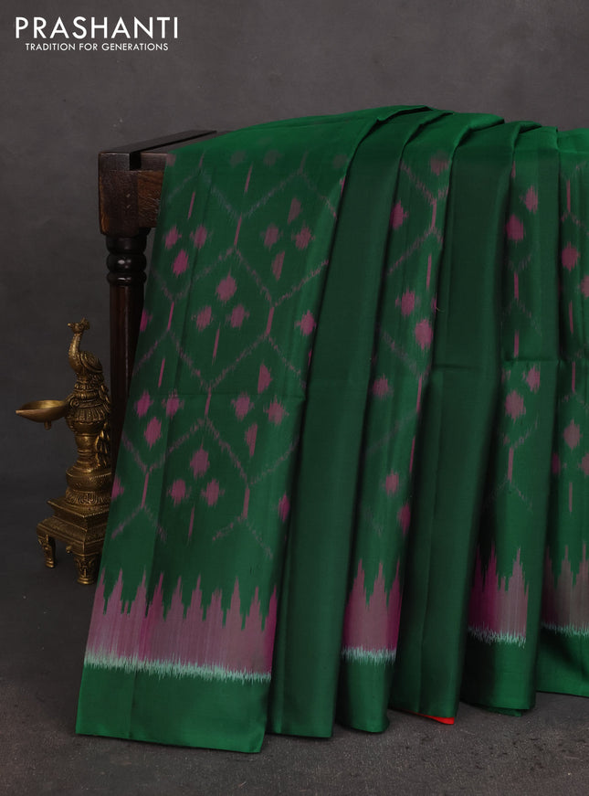 Ikat soft silk saree dark green and red with allover ikat weaves & floral zari buttas in borderless style