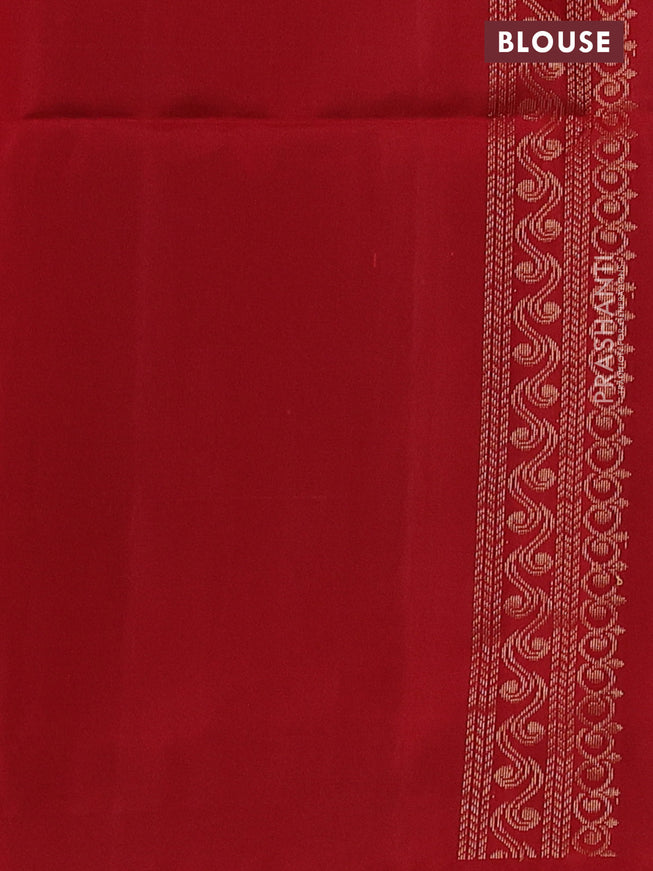Ikat soft silk saree black and red with allover ikat weaves & floral zari buttas in borderless style
