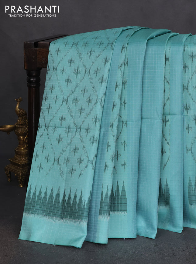Ikat soft silk saree teal blue and peach pink with allover ikat weaves & zari buttas in borderless style