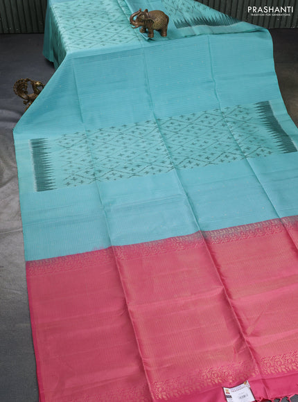 Ikat soft silk saree teal blue and peach pink with allover ikat weaves & zari buttas in borderless style