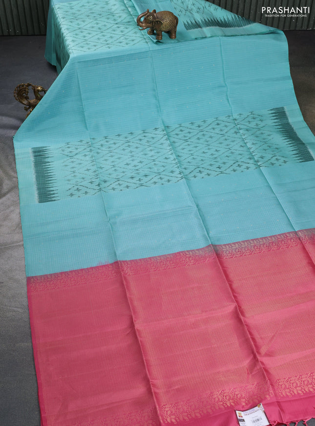 Ikat soft silk saree teal blue and peach pink with allover ikat weaves & zari buttas in borderless style