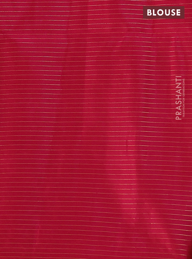 Ikat soft silk saree green and pink with allover zari checks & ikat weaves in borderless style