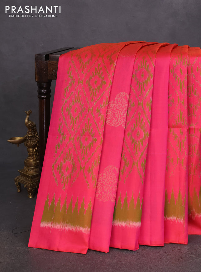 Ikat soft silk saree pink and green with allover ikat weaves & zari buttas in borderless style