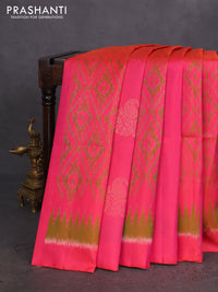 Ikat soft silk saree pink and green with allover ikat weaves & zari buttas in borderless style