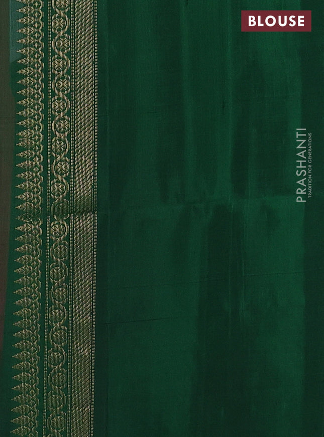 Ikat soft silk saree pink and green with allover ikat weaves & zari buttas in borderless style