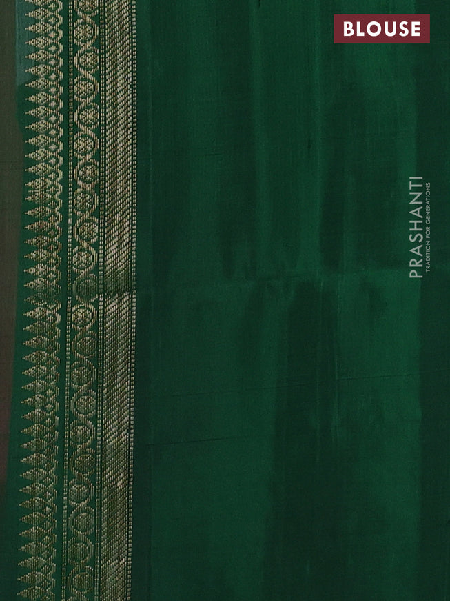 Ikat soft silk saree pink and green with allover ikat weaves & zari buttas in borderless style