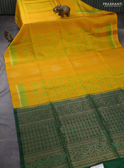 Ikat soft silk saree mustard yellow and dark green with allover ikat weaves & zari buttas in borderless style