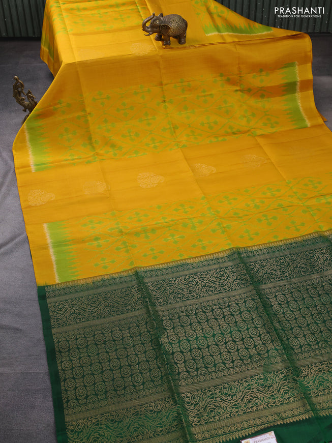 Ikat soft silk saree mustard yellow and dark green with allover ikat weaves & zari buttas in borderless style